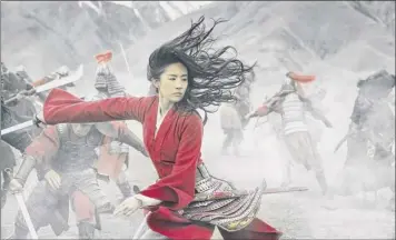  ?? Jasin Boland /Walt Disney Studios Motion Pictures ?? Yifei Liu stars as the title character in “Mulan.” Disney CFO Christine Mccarthy admitted the company is facing backlash stemming from the film credits thanking Chinese government.