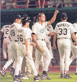  ?? JEFFREY BOAN/AP ?? Marlins pitcher Al Leiter tips his hat to the fans after pitching a no-hitter against the Rockies in Miami on May 11, 1996. It was the first no-hitter in the Marlins’ history.