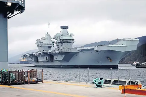  ?? ?? AGREEMENT: The deal will see HMS Queen Elizabeth, pictured, and HMS Prince of Wales undergo maintenanc­e.