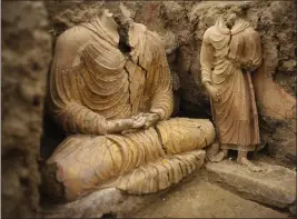  ?? DUSAN VRANIC — THE ASSOCIATED PRESS FILE ?? Buddha statues are seen inside an ancient temple on Tuesday in Mes Avnak valley, south of Kabul, Afghanista­n. The valley is the world’s second-largest unexploite­d copper estimated to be worth nearly $1 trillion.