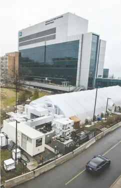  ?? PETER J. THOMPSON / NATIONAL POST ?? Burlington’s Joseph Brant Hospital has started admitting COVID-19 patients into its tented addition.