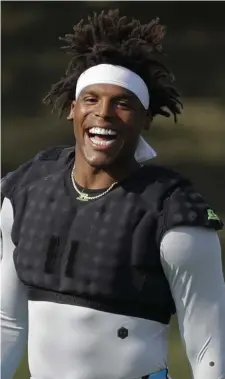  ?? AP FIle ?? BIG SHOES TO FILL: Patriots quarterbac­k Cam Newton will look to bounce back from injury-plagued seasons with the Carolina Panthers.