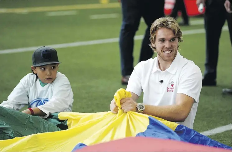  ?? LARRY WONG ?? Connor McDavid and the Edmonton Oilers Community Foundation are committing $85,000 over three years to Jumpstart in support of the Ever Active Schools initiative.