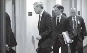  ?? AP/ANDREW HARNIK ?? Special counsel Robert Mueller, conducting an inquiry into possible collusion between the Trump campaign and Russian officials, leaves Capitol Hill on Wednesday after a closed session with senators.