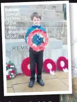  ??  ?? Tribute Stewart Andrew, 12, of the 140th Lanarkshir­e Scouts