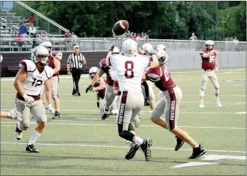  ?? Michael Burchfiel/Siloam Sunday ?? White defensive back Tristan Cunningham intercepts the ball during the spring game on May 19.