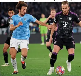  ?? GETTY IMAGES ?? Old foes: Kane battles ex-Arsenal player Guendouzi