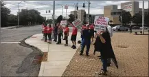  ?? STAFF ?? Montgomery County Common Pleas Judge Richard Skelton has issued an injunction to prevent the Children Services union workers, marching here, from walking off their jobs.