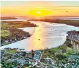  ?? ?? Sunset at Bosham Harbour, West Sussex. The South is set to enjoy balmy 14C