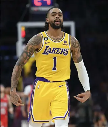  ?? KEVORK DJANSEZIAN — GETTY IMAGES ?? D’Angelo Russell, out with an ankle injury since Feb. 23, is expected to play for the Lakers tonight against Toronto.