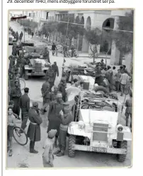  ??  ?? Commonweal­th-tropper ankommer til den libyske by den 29. december 1940, mens indbyggere forundret ser på.