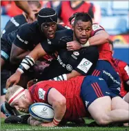  ??  ?? EYE OF THE STORM: Billy Vunipola (centre) in action