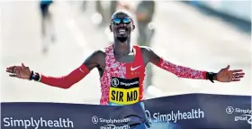  ??  ?? Personal best: Mo Farah breaks the tape to win the Great North Run in Newcastle