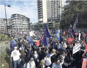  ??  ?? Anti-Brexit campaigner­s take part in the People’s Vote March for the Future in London, yesterday.