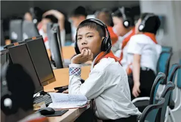  ?? WONG MAYE-E/AP ?? North Korean students use computers at the Sci-Tech Complex in Pyongyang, which are limited to the nation’s intranet.