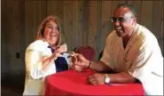  ??  ?? Fran Yanubavich of TD Bank shares a laugh with Baseball Hall of Famer Jim Rice during a Tuesday afternoon luncheon at the Desmond Hotel & Conference Center in Colonie held in advance of the 2017New York-Penn League All-Star Game.