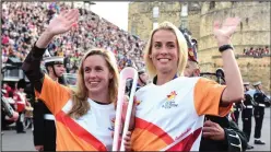  ??  ?? Swimmer Ross Murdoch, and Hannah Miley and Lynsey Sharp with the Gold Coast 2018 Queen’s Baton in Edinburgh