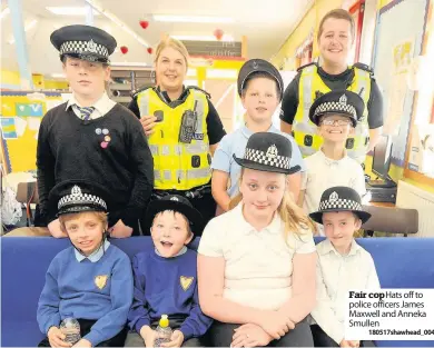  ?? 180517shaw­head_004 ?? Fair cop Hats off to police officers James Maxwell and Anneka Smullen