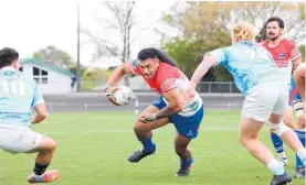  ?? Photo / Club Rugby ?? Horowhenua-Kapiti blindside flanker Jordan Tupai-Ui surged for the tryline late in the game against East Coast at Levin Domain.