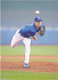  ?? MIKE JANES, FOUR SEAM IMAGES, VIA AP ?? Dodgers prospect Walker Buehler was recently promoted to Class AAA after striking out 64 Class AA batters in 49 innings.