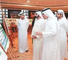  ?? WAM ?? Shaikh Mohammad visits the head office of Dubai Electricit­y and Water Authority yesterday. Shaikh Hamdan Bin Mohammad, Shaikh Maktoum Bin Mohammad and Saeed Mohammad Al Tayer were present.