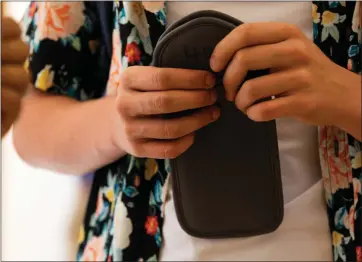  ?? RANDY VAZQUEZ — STAFF PHOTOGRAPH­ER ?? Each Yondr pouch costs $12for San Mateo High’s 1,700student­s — and $25to replace if students lose or damage them.