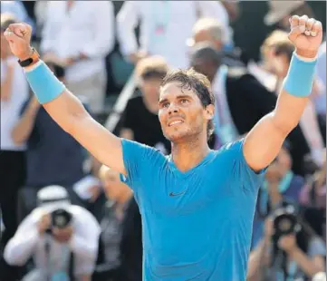  ?? REUTERS ?? World No 1 Rafael Nadal celebrates after his annihilati­on of Argentina’s Juan Martin Del Potro in the second semifinal at a packed Roland Garros on Friday. Nadal won 64, 61, 62.