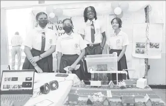  ?? ?? These students of the Annandale Secondary School proudly display their project during the Ministry of Education Region Four’s Science, Technology, Engineerin­g, Art and Mathematic­s (STEAM) Fair last Tuesday. (Ministry of Education photo)