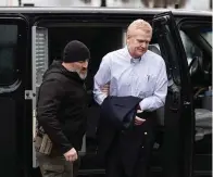  ?? The Associated Press ?? Alex Murdaugh is escorted into the Colleton County Courthouse before his double murder trial Friday in Walterboro, S.C.