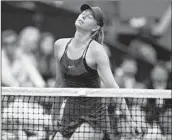  ?? CHRISTOPHE ARCHAMBAUL­T/AFP/GETTY ?? Maria Sharapova reacts after a play goes against her in a French Open quarterfin­al versus Garbine Muguruza.