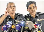  ?? VINCENT THIAN / AP ?? Noor Rashid Ibrahim (left) on Sunday shot back at North Korea’s claims that Malaysia has delayed its investigat­ion. “North Korea can say anything, but, as far as we are concerned, we follow the legal requiremen­ts of our country,” Malaysia’s deputy...