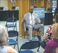  ??  ?? James P. Harris Jr., a candidate for Woodland Hills School District superinten­dent, speaks during the introducto­ry event.