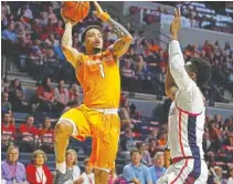  ?? THE ASSOCIATED PRESS ?? Tennessee guard Lamonte Turner (1) shoots over an Ole Miss player last Saturday in Oxford, Miss. The Vols host Georgia this Saturday.