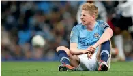  ?? — Reuters ?? Manchester City’s Kevin De Bruyne reacts after sustaining an injury during the league Cup game on Thursday.