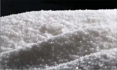  ?? THE ASSOCIATED PRESS ?? A new study released Monday details how the sugar industry worked to downplay emerging science linking sugar and heart disease. It’s the latest installmen­t of an ongoing project by a former dentist to reveal the industry’s decades-long attempt to...