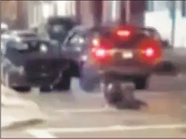  ?? ?? A witness captured cell phone video of NYPD officers being injured after driver who had been pulled over sped off. One man was arrested and faces several charges in the Bronx incident.