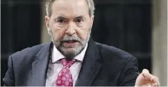  ?? ADRIAN WYLD / THE CANADIAN PRESS ?? Despite Thomas Mulcair’s efforts to hold him accountabl­e, Justin Trudeau’s vacation controvers­y does not hold lasting power, the Post’s Michael Den Tandt writes.