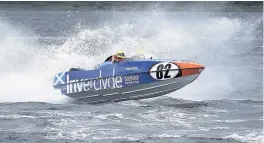  ??  ?? Making waves Power Boat Race, by Clive Turner