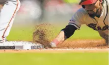  ?? David John Griffin / Icon Sportswire via Getty Images 2019 ?? Speedy Billy Hamilton, seen with the Braves, could be useful as a pinchrunne­r under baseball’s new rule for extra innings.