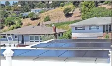  ?? Ed Matney / Solaria Corp. via AP ?? Business owners who install solar panels see a growing awareness and concern about the environmen­t, and a desire by consumers to lower energy costs.