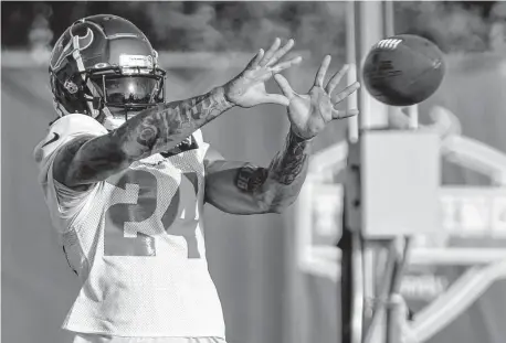  ?? Photos by Brett Coomer/Staff photograph­er ?? Rookie cornerback Derek Stingley Jr. should prove to be a catch after being selected third overall in the 2022 draft.