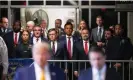  ?? Curtis Means/AP ?? Byron Donalds, Doug Burgum, Mike Johnson, Vivek Ramaswamy and Cory Mills look on as Donald Trump talks to the media outside Manhattan criminal court. Photograph: