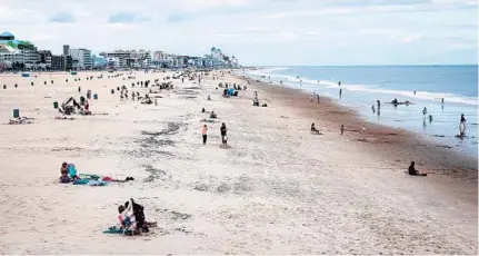  ?? MICHAEL ARES/BALTIMORE SUN ?? Vacationer­s start the Memorial Day weekend at Ocean City. Many people are discoverin­g an upside to taking shorter, more frequent vacations instead of fewer longer ones. Officials at Ocean City also see potential benefits to merchants.