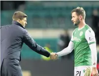  ??  ?? RESPECT Jason Naismith shakes hands with Gers boss Steven Gerrard following Friday’s 3-0 defeat