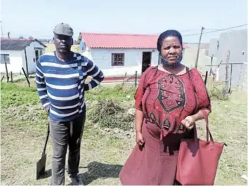  ??  ?? AT RISK: Mdantsane resident Xolile Pukuza and his sister Cynthia Pukuza still live in a house with asbestos roofing at NU 9. Xolile suffers from asthma.