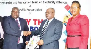  ?? Photo: AEDC ?? From left: Director of Public Prosecutio­ns of the Federation, Mr. Mohammed Umar; Managing Director/CEO, Abuja Electricit­y Distributi­on Company (AEDC) Plc, Engr. Ernest Mupwaya; and Company Secretary/Director Legal Services of AEDC, Mrs. Olajumoke...