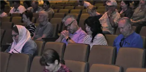  ?? PHOTO TOM BODUS ?? Congregati­on members bow their heads in prayer during a National Day of Prayer celebratio­n Thursday at Christ Community Church in El Centro.