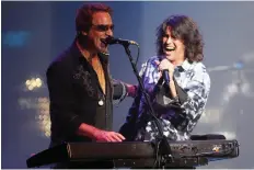  ?? NICK BRANCACCIO/FILES ?? Foreigner’s Thom Gimbel, left, and Kelly Hansen return to the Colosseum Sunday as part of The Cold as Ice tour.