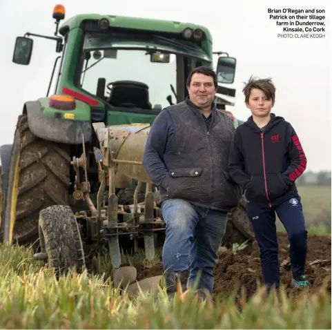  ??  ?? Brian O’Regan and son Patrick on their tillage farm in Dunderrow, Kinsale, Co Cork