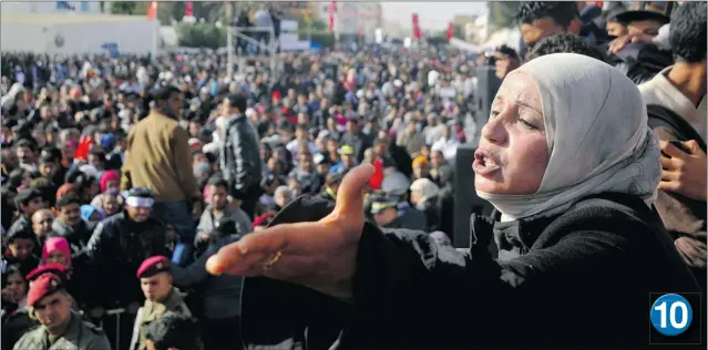  ?? HICHEM BORNI/ THE ASSOCIATED PRESS ?? 10 The Arab Spring proved Muslims want democracy, too, and that is being exhibited best in Tunisia, which analysts call the most authentica­lly ‘ liberal democratic’ of Arab Spring countries. For the most part, support for democracy springs from its...